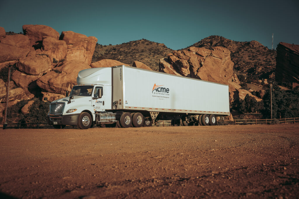 Denver trucking company freight transport services semi-truck delivering cargo throughout Colorado