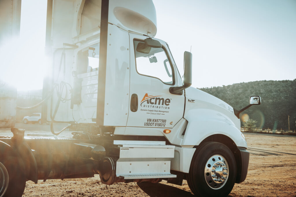 Denver trucking company transload freight services truck facilitating cargo transfer and cross-docking operations