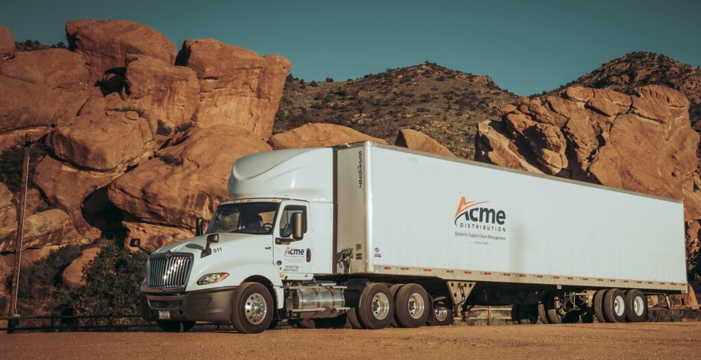 Freight brokerage truck operating on Denver to Tacoma shipping routes with professional logistics coordination