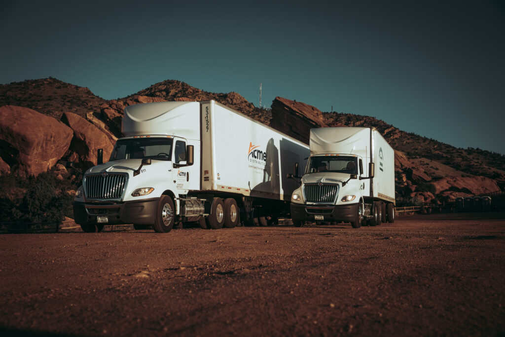 Denver freight brokerage semi-truck operations showing professional logistics and transportation management
