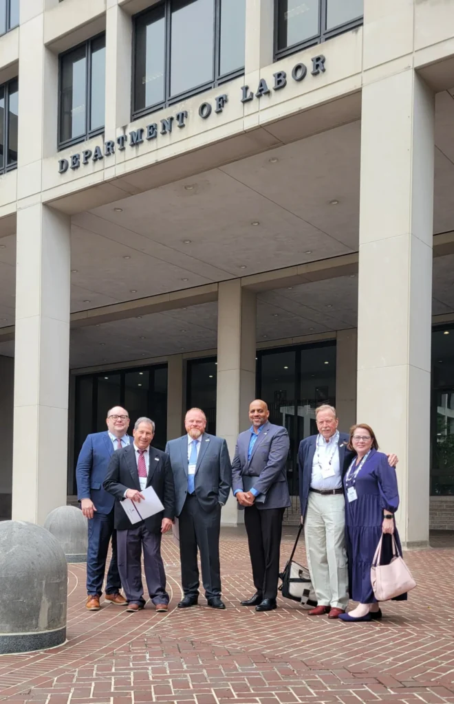 Doug Sampson, Chairman of the International Warehouse Logistics Association (IWLA), meets with the Director and Deputy Director of OSHA at the U.S. Department of Labor to discuss workplace safety and issues impacting the logistics industry.